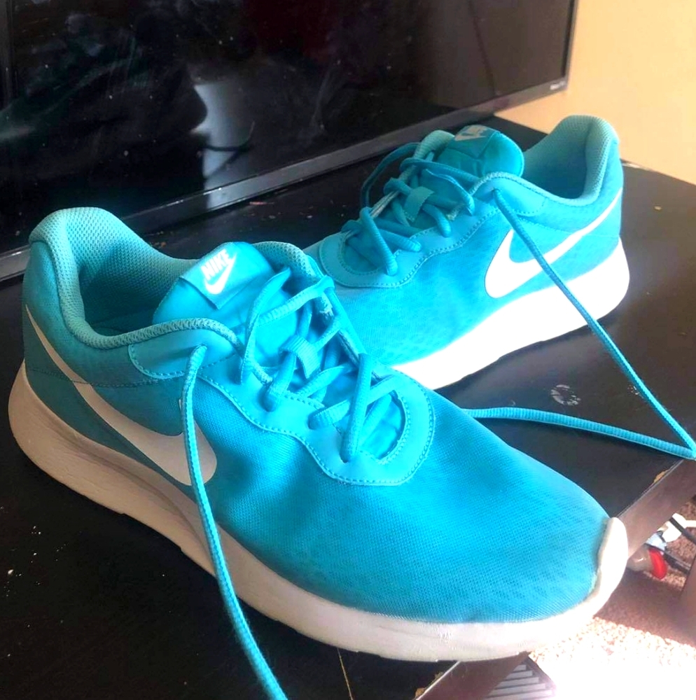 Baby blue Nike shoes